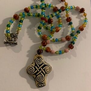 Celtic cross, vintage and artisan made. I can’t find another one just like it